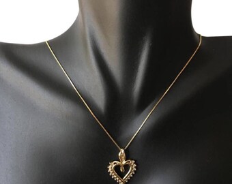 10k diamond charm in a 14k chain