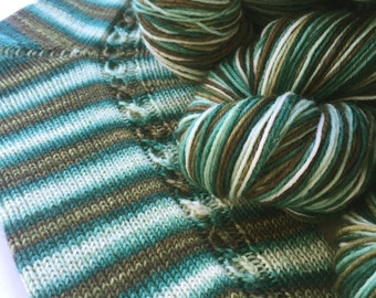 Hand dyed self striping sock yarn - In The Pines