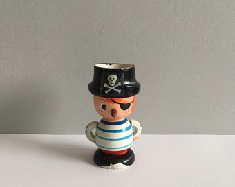 Vintage wooden pirate egg cup.