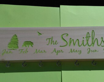 Customized ,Engraved Family Celebration board /family calendar board with free 20 blank disc's and bear in background.(3.5x20 FC_bear 8.3)