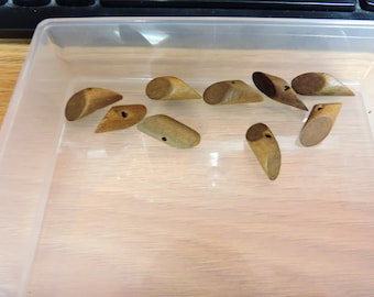 9 wood beads 8mm drilled center X about 20mm tip to tip