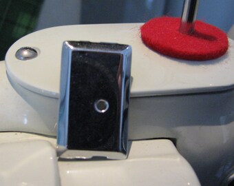 Original hard to find Singer Featherweight feed dog cover plate , simanco number 108002.