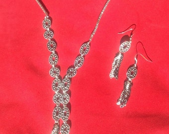 Asymmetrical Brass and Silver jewelry set
