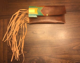 Hand tooled leather clutch with fringe