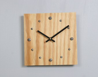 Plywood clock with stainless steel hour markers and Tung oil finish. USPS priority shipping to USA included