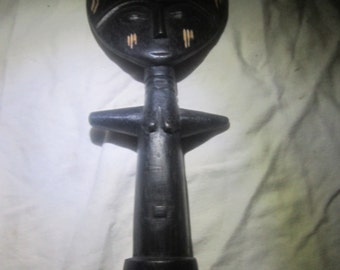 Ebony wood fertility doll,
