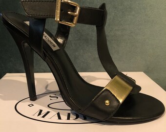 Black and gold leather Steve Madden heels