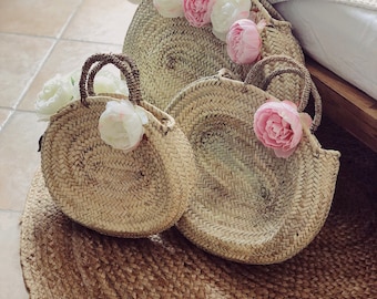 Oval basket with peonies