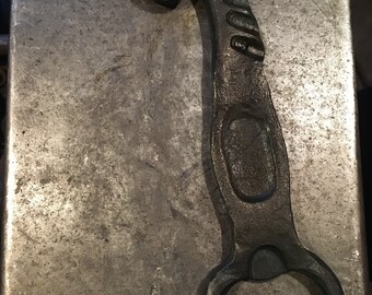 Hand forged horse head bottle opener