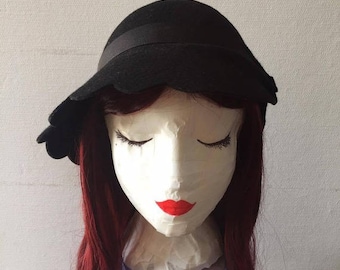 Hat cloche asymmetric roaring twenties-inspired woman