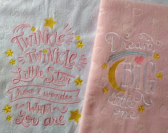 Blanket with embroidered nursery rhyme