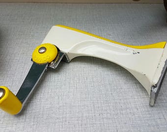 Wall mounted can opener, sixties vintage