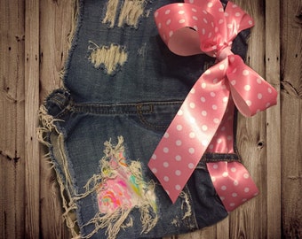 Bright floral patch distressed shorts