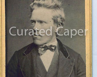 Original vintage photograph of a man looking left