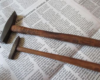 pair of vintage tack hammers wood handles small and large