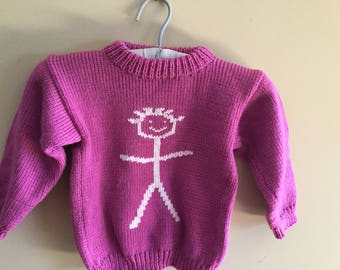 Children's handknit sweater with stickman