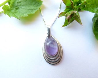 Amethyst Pendant. Sterling Silver Pendant set with a Brazilian Amethyst Cabochon.