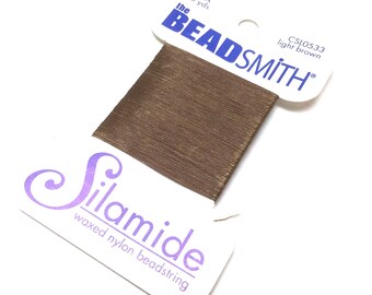 BeadSmith Silamide. Waxed Nylon Bead String. Size A. Stringing Supplies. Beadweaving Thread. Beading Thread. Light Brown. 40 yards. One (1).