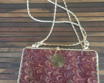 It's a bag hand made from an old beautiful book