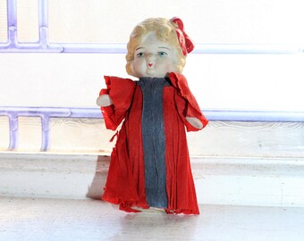 Vintage Doll Frozen Charlotte with Crepe Paper Dress