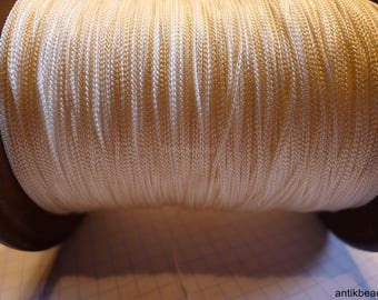 antique bobbin with square tricotine