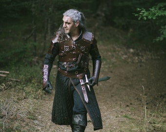 Witcher Gambeson - Geralt Cosplay Costume. Long sleeved black witcher gambeson with leather fastening for cosplay and other