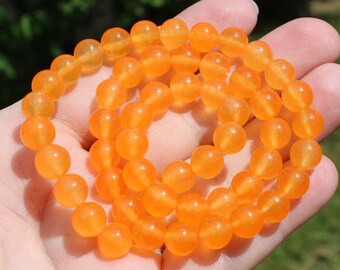 Round 8 MM AAT58 Orange chalcedony beads