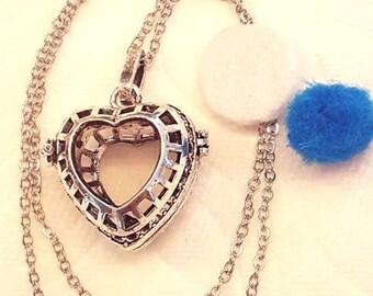 Heart shaped essential oils locket.
