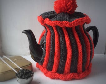 Handknitted striped medium tea cosy