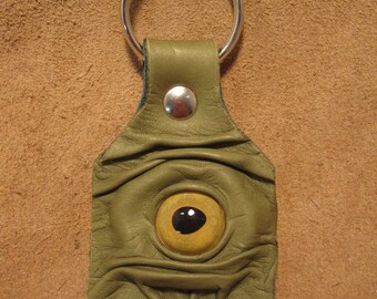 Grichels leather keychain - spring green with yellow fish eye