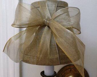 Beautiful robin egg blue with metallic gold chandelier shade.