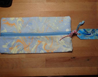 Pencil case, paintbrushes,