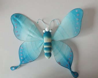 Christmas collectible ornament.Blue large butterfly, 9.5"W, 8"H. Christmas tree ornament.