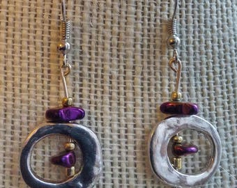 space glam earrings, purple rocks