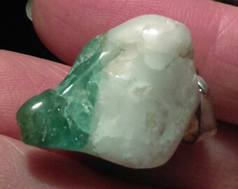 Natural gemmy emerald in quartz pendant