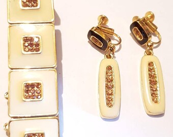 Joel clip on earrings and bracelet set. Vintage earrings and bracelet. Gold and rhinestones clip on earrings set