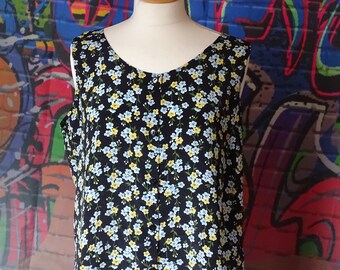 Lovely black with blue and yellow floral pattern sleeveless blouse