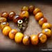 Reserved Layaway for "Bones" Do not buy Thank You/19 Bead Rich Dark Golden Amber Resin Fair Trade Statement Necklace/For her/From Kathmandu