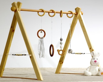 Portico educational Montessori baby gym, gray and white version, 4 rings, spheres in wood on the sides.