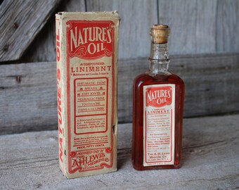 A. H. Lewis Nature's Oil Liniment Sealed Antique Corked Medicine Bottle with Box, Full Paper Label, and Insert