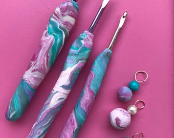 Hand sculpted ergonomic clay crochet hooks with matching Purl Planet stitch markers