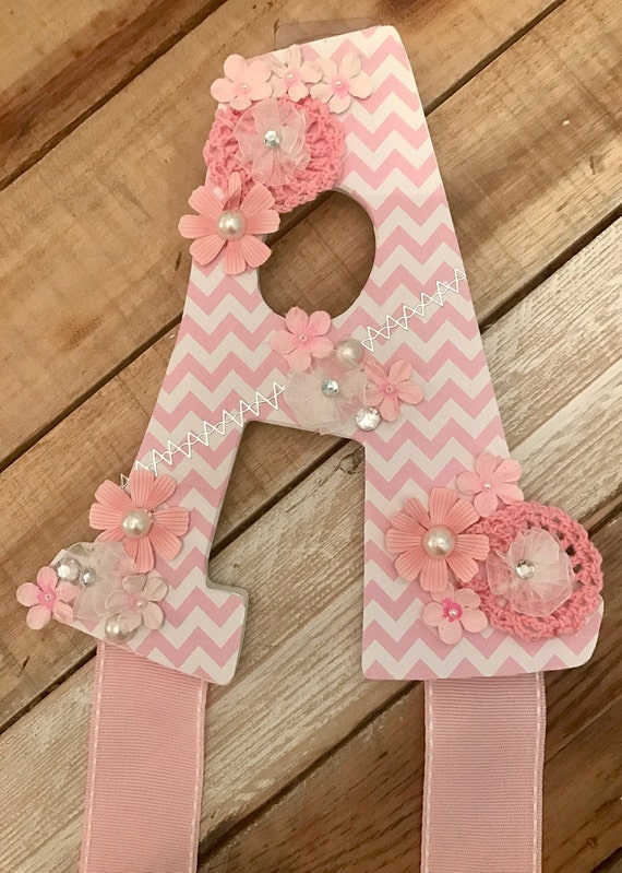 Pink letter A bow holder and free bow