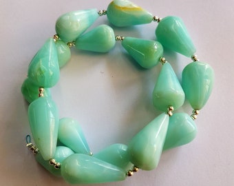 16.5 inch strand approx , Peruvian opal Smooth Drops beads , 11X15 mm to 12X18.5 mm smooth drops , M No. - 1027