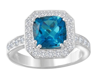 Blue Topaz and Diamond Ring
