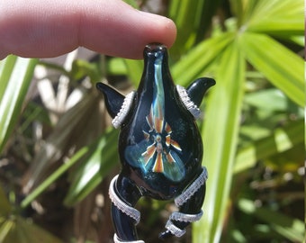 glass pendant wrapped in sterling silver wire