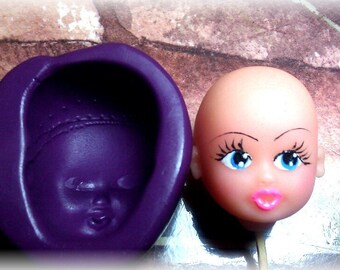 Silicone mold, with the face of a little girl.002/Molde de silicona ,la cara de una niña.