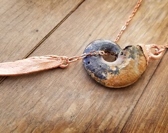 Pyritized Ammonite and leaf lariat necklace