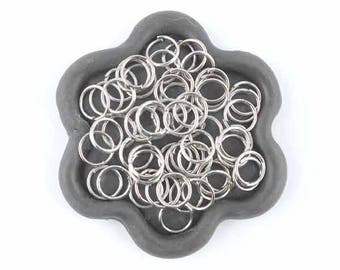 x 100 Silver jump rings 7mm (06th)