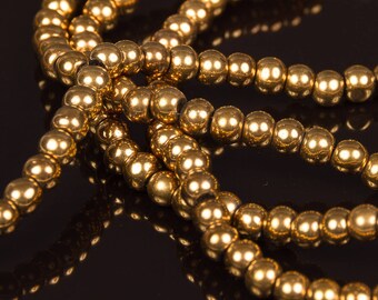 1 row of 70 Gold 4mm electroplate glass beads