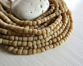 small matte beige seed glass bead, matte opaque , irregular barrel tube spacer, New Indo-pacific 3 to 6 mm / 22 inche strand - 7ab29-32